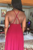 For the price this is definitely a bridesmaid dress that is such good quality. It is something that you could easily find at David's Bridal for 200. The beautiful back straps are adjustable so it will fit your waist and hold your boobs up, especially for bigger breasted women. It was a little lighter than what I expected for a wine color but all in all a gorgeous dress. - Edna K.
