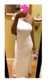 Bought this dress for my upcoming civil wedding. I am totally in love with it. It's beautiful made. Material is good quality. The fit is the bum. Shipping took just a few days. Packaging was very neat. The shipping was free which is a bonus. I highly recommend this dress. - Sandy S.