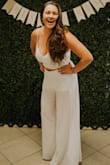 I purchased this outfit for my Wedding Shower. The outfit was a little on the revealing side for my normal taste as I NEVER wear two-piece sets. I just had to have it though, It arrived and literally formed to my body! The outfit is TRUE TO SIZE, though I could have had the waistline of the pants taken in just a tad to sit a little better on my waist, but I also don't think I needed a full size smaller either! I'm pretty busty and the top was very accommodating! It fit to my liking, covered very well, and I did not need ANY extra support (which is a HUGE plus in my book)!!!! I'm also tall, 5'7, and still wore 3.5-inch heels too! Obsessed with this outfit and can't wait to wear it again! - Francesca M.