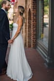I was pleasantly surprised at how well this dress worked out for my wedding. We held a very small ceremony and this dress was perfect for the occasion. I received so many compliments and loved the way it made me feel. - Samantha R.