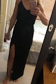 I love this dress! It's very simple but adds a hint of sexy with the thigh slit. I have this dress in both red and black. With that being said...I had a hard time finding the right size. I ended up keeping the small in the red and sized up with a medium in black. The red was a little snug in my hip/thighs but not enough to switch. The black was too tight in a small but the medium fit perfectly. Oddly, the medium black dress was shorter in length compared to the red small. It was hard to wear flats with the red, as it drug on the ground. Keep that in mind when ordering- size and length tend to vary but it was worth figuring it out! See attached photos. - Tara R.