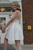 I ordered this for college graduation. I really liked it and it fit good. It went out a little like I wanted. It was just a little big in the bust area. It was more the straps were too long and made the bust area not as tight. I think if I could've got the straps tightened by someone that sews it would've been better. I have this problem a lot though because my torso is very short. - Lauren H.