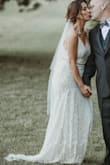 The dress was perfect! I ordered a small. Kept it on all night because it was so comfortable. It has a slight stretch to it. I've received so many compliments! - Krista W.