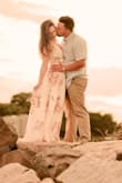 I am absolutely in love with this dress. It was perfect for my engagement shoot, a big long but it worked out perfectly with the wind and beach. - Kaitlin L.