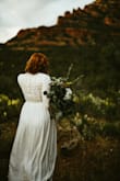 This dress was perfect for a photo shoot! It's flowy and beautiful with very unique stitching on top. Overall a big win! I ordered a large which is my usual Lulus size and it was a bit tighter in the waist than other Lulus dresses. But not something I would size up for as that would have made everything else too big. - Miranda Y.