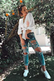 So simple yet so pretty! First time wearing it I paired with a pink bralette and distressed jeans for a casual look and totally loved it! Fabric is comfortable and it's a great fit! - Kaitlin B.