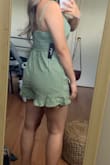 This romper looks exactly like the pictures shown on the website! Great length, not thin, & doesn't seem like it will ride up on you! This romper doesn't really add shape to your waist, but it's cute regardless. - Casie T.