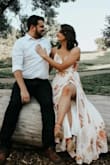 The moment I saw this dress I knew it was the one I had to wear for my engagement photos. The dress fit perfectly, it was a bit long but I wore heels so it worked out! The end of one of the ties wasn't stitched up properly, but other than that it was absolutely beautiful! - Erin O.