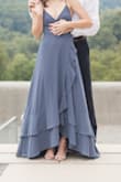 Bought this for some engagement pictures and LOVED it! The top fit nicely and I love the tie back as it can make the top fit anyone. I really should have got the dress hemmed as it was still long with 2" heels but time didn't permit. I can't wait to wear this dress again! - Jordan G.