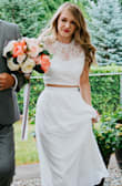 While this dress wasn't my original choice for a wedding dress, I felt absolutely amazing in it. I originally bought a wedding dress from davids bridal and was never able to get it altered in time for the wedding so I bought this as a replacement. It was better than expected and I got so many compliments on it. I love the two piece modern design. I paired a jean jacket with it after the ceremony was over to dress it down and to stay warm on our chilly wedding day. Overall this dress not only saved the day but also made me feel so beautiful! - Jessica H.