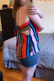 I have to return this one--it's cute, just doesn't look great on me. It was somehow a bit too tight across the chest (34D) so sort of flattened the girls, yet at the same time had extra material around the pit area? I also tried this on with regular bra, braless, sticky-bra, and taping, and nothing made it look good on me. - Leah Z.