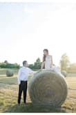 I wanted a boho white lace dress for my engagement shoot and this one was perfect! The length was just right for me when I added 2.5" heels. The train was not too long or short. The dress looks beautiful in outdoor photos. The dress doesn't feel cheaply made as there's two layers. I would say it's more off white than a pure white. - Jessica K.