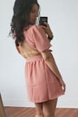 I love everything about this dress. It is so romantic. It is a wraparound dress, which accentuates your curves. The puffy sleeves are long which keeps them from being overwhelming. And the cut in the back coupled with the length add just the right amount of sexy. Highly recommend this dress. - Abigail G.
