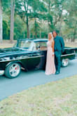 The dress was simple yet elegant and the back was open with criss cross straps. I received a lot of compliments on this dress and think it makes a perfect bridesmaid or formal evening gown. - Jeri S.