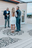 I wore this dress for my wedding. Absolutely loved it! I wanted a classy shorter dress and it was perfect! I debated on ordering a small for a more fitted look, but instead chose a medium for comfort. - Angie C.