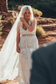 After trying a few different sizes after reading reviews I ended up purchasing a large! (Sometimes I can fit into small and others large) because I have a booty and big breasts. I absolutely love and think it's worth price and was planning on using for my wedding but ended up eloping. Added a belt and veil - Katlin H.