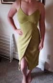 Looovvve the back of this dress. The color is stunning. You will definitely want to go braless or with petals. The slit is high but they overlap so it isn't very concerning moving around. Very happy with my purchase. - Kendra T.