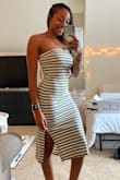 I sized down to an XS (I'm usually in a small) after reading some of the other reviews and I'm glad that I did! This fits like a glove. The material is thick and comfy, I can easily wear this without a bra. Very stylish. - Aliyah B.