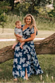 I absolutely love this dress and I've gotten so many compliments. I wore this for my family photos and it photographs beautifully. I have very large breasts (38HH) and I did have a bit too much cleavage so I just sewed the chest closed and it's perfect! I'm also only 5'3" so I had to have it altered but that's pretty normal for me. - Jacqueline S.