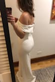 I got this as a potential elopement dress since Covid screwed up my original plan. The material is pretty thick and stretchy making it very comfortable and flattering. The simple and modern design makes it look more expensive than it is. Would need to steam out the wrinkles. My only regret is that it doesn't have a train, though it is a bit long on my short 5'3' self - I was wearing 2" heels in these photos.  Loved it! - Lauren D.