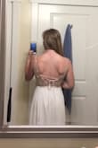 This is such a lovely dress! As much as I wanted to keep it, it was just too small in the back and I decided on another dress! The material feels like top quality and it was a good fit at the waist and chest. However, I have an exceptionally broad back and shoulders from being a swimmer - so it just wasn't quite right. I'm a size small in dresses with some forgiveness in the back, and medium if not. If you're like me with an athletic build, I suggest sizing up! - Kat C.