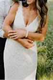 This dress was gorgeous ! So comfortable and It fit perfectly besides the length was too long but still wearable. I postponed my large ceremony for next year and didn't want to wear my real wedding dress so I purchased this dress and it looks just as expensive as my real one, everyone loved it! - Bryann R.