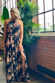 I love this dress so much!! Ties nicely around your neck, and the elastic waistband is comfortable and gives some shape. I got so many compliments and felt amazing in it. I've had it for a couple of years and it looked nice when I was 160lbs and also 145lbs, so I like that for sure! I probably could have worn a M because the L was a tiny bit big, but honestly it was comfortable so I don't mind. - Laura B.