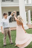 This dress was perfect for my engagement photos! It was beautiful, light weight, and comfortable! Also love that it's a high low because the front fell right above the ground so I wasn't tripping over it the whole time! - Acacia T.
