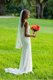 This dress was perfect for my minimony wedding!!! I tried on several $1,000+ gowns at different bridal boutiques and couldn't find the perfect dress. I remember looking at this dress online only to find out it was completely sold out. I called and checked back every day until it was in stock again. I'm so happy that I took a chance and ordered this dress online. I ordered a small at first and it was really loose around my waist and chest. Then I ordered the extra small and it fit perfectly. I didn't get any alterations but I added bra inserts and a nude undergarment since the dress is a bit see through. I added a veil, a belt, earrings and sparkly heels to complete the look. If you are considering buying this dress, look no further. You will be so happy with the quality, color and price of this dress. Everybody thought this was a designer dress and couldn't believe that I had gotten such a good quality dress online! - Ashley A.