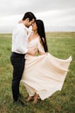 The top was very loose, but it came across stunning in photos!! It was a great choice for my engagements! - Michelle B.