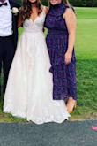 Super cute and fun dress! Wore it to an outside summer wedding and felt super comfortable! - Genevieve G.