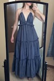 I usually go for a medium in lulus dresses, and sometimes that size is too small for my hips, but the size small in this dress works great! 
The top fits secure around my bust except when I twist a lot to the side. 
The skirt is a bit heavy for summer, so maybe better for late spring or early fall.
I'm pleased with it overall! - Amanda T.