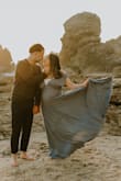 I bought this dress for my maternity photo session, and it turned out beautiful. The material was stretchy and breathable, it allowed me to move around freely.I bought Large because by bust area had grown a lot and I wanted to cover them a little..lol.. - Aycan E.