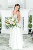 This dress is amazing! I overnighted it after having to postpone my wedding (2x) and have a micro wedding. I'm usually in between a 2 and a 4, depending on where I shop. It fit perfect! The straps are not adjustable, but that wasn't an issue for me. - Amanda J.