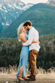 This dress was perfect for my engagement photos. The open back and flowy skirt are stunning in a natural setting, and look amazing in pics. - Becca T.