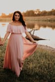 This dress fit perfectly. I loved everything about it. The quality was incredible and it fit like a glove, so flattering. The one thing I will say was a downfall for me was the length. It was long for me, even with heels on. All I can say is BUY THIS DRESS. Our engagement photos turned out beautifully thanks to this dream of a dress - Hillary B.