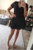 The back sort of bunches up but I think that's due to back fat, haha. Very cute dress. Very modest, but still some cleavage if you have any boobs. I have very long legs and its short but not too short. Definitely doable! keeping! - Samantha D.