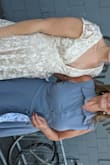 The dress fit perfectly and has a beautiful skirt. It was out of stock when I first looked, but I kept checking and was able to order my size. I love the cut and the back. I wore it at my wedding and it was perfect for the venue. I honestly couldn't be happier. - Amanda H.