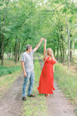 Wore this dress for engagement pics & I loved the pop of color! I probably should have ordered a large but it's a wrap dress so it worked. - Sarah C.