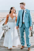 I ended up ordering this beauty 2 weeks prior to getting married - we swapped our 200 person wedding for an intimate beach ceremony and my original dress was not altered yet (after postponing twice). This dress was absolutely stunning - I ended up getting it hemmed about 2-3 inches but overall PERFECT :) - Taryn G.