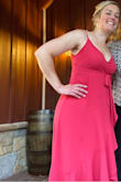 I loved the dress the second I saw it online.  My mom had to make a few alterations to it and then had to literally sew me into the dress where it meets in the front between my boobs.  Hard to describe but it seemed like there was too much material, the boob seams didn't seem to align where they are supposed to and I had the straps about an inch and a half from the tightest they would go.  Still got many compliments on it and I loved the color!  Also, fun fact: if you walk down the stairs fairly quickly, the dress fans out almost like Marilyn Monroe style; not up as high but still need to be mindful of how open the front is. - Maria T.