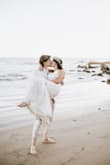 I absolutely loved this dress for my small beach ceremony! The details are amazing and no one could believe the price. The only thing I would say is it runs a little long, I'm 5'4" and ordered a size small and I needed high heels in order to walk in it! - Kelsey B.
