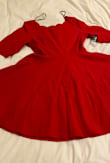 Love skater skirt bottoms. The neck line is fun and different. The fabric is heavier, but slight stretch still, so this dress would be great for fall or winter events. - Alexandra G.
