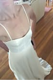 I am a Pinterest fanatic and have been searching for my dream dress for years while pinning like crazy. When it finally came down to choosing one, my heart instantly fell in love with this beauty even before I realized the incredible price. This dress just oozes class and elegance!
Pros:
-Fits like an absolute glove
-Surprisingly heavy & well made
-Has 3 individual layers to the skirt
-Gorgeous flair while twirling
-Took my fiancé's breath away
(Yes- I already showed him because, well, he is my best friend!)
Potential Cons:
-If you have a C cup or larger, this dress probably isn't for you. The cups on me fit perfectly and are padded so a bra is unnecessary.
-This dress is rather long, however, it only added to the whole wearing experience for me. I am going with flats and love how the layers fall onto one another while gathering on the floor around my feet.
In conclusion, If I saw this gown on a bride without prior knowledge, I would guess she paid around $850-$1200 easy. Five stars! - Nicola W.