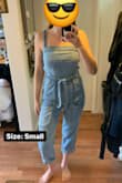 I ended up trying both the M and the S. I'm a solid Lulus M in basically everything, and I've read Free People can run small. Based on the size chart (and I chatted an agent about it too for the first time, cool tool!) I ordered a M. The waist was a hair big, but doable, but the top was way too baggy.

I debated a bit, and ended up exchanging for a S. If you search this piece on google, there's a cute outfit with a white sweater underneath and booties, that's what I was hoping to replicate.

So the S: it's difficult to get over my booty, but fits to a T everywhere once on. But, it's now so fitting that I can't layer a sweater underneath.

I've decided to keep the S and I'll mix up the look with a cardigan over the top instead. I prefer the fitted bust. - Ellen P.