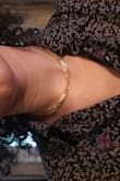 This choker has an excellent adjustable length and it lays very nicely along the contours of your neck/collarbone. Adds just the right amount of elegance to a simple outfit! - Victoria R.