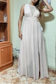 It fits perfect! The fabric, color and size was awesome. I loved that it is a long dress because I can use it with high heels. I dont have a large bust, so it was just a little loose just in that part, but other than that it was amazing. No regrets. - Sossy V.