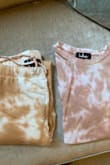 The top and bottom are cute and soft; they just don't match. The colors of the tie-dye are off. One has pinkish the other more brownish. Wanted to love it, but now stuck with two pieces that can't be worn together. - Jamie T.