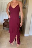 This dress fits like a glove in the bodice and flows beautifully from the hips to the floor. The dress is plenty long!! It will be lovely at my sons wedding! - Romy G.