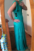 This dress is gorgeous and the quality is very good! I ordered these as all of my bridesmaids dresses and am very excited about them. They flatter every body type. A few of my girls were debating between two different sizes - the smaller of the two ended up working in every case, this is a true wrap dress with a lot of fabric to work with! The slit is not nearly as pronounced in person as it is on the model, so it is not overly revealing which I liked. Don't hesitate, buy them! - Andrea